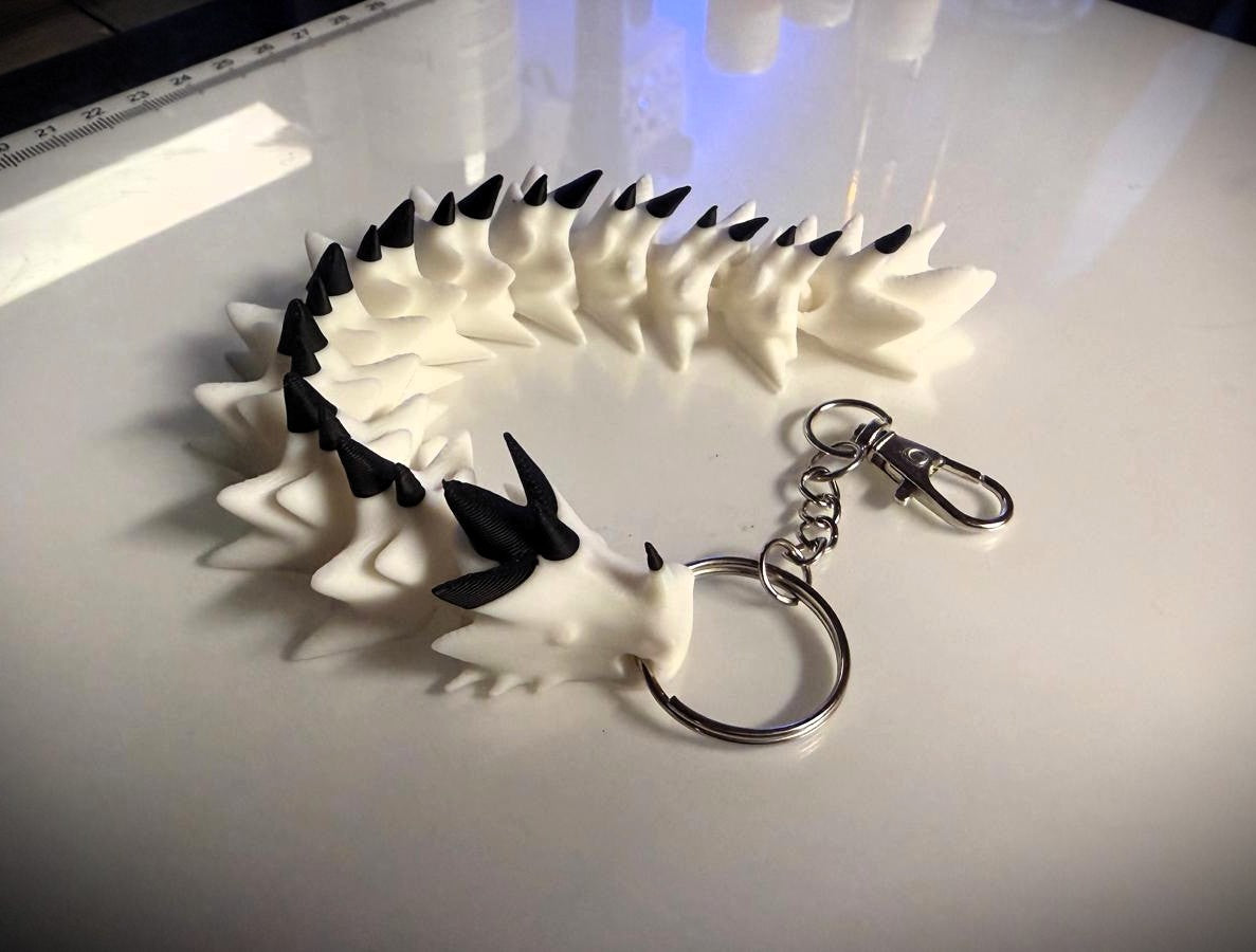 Schlüsselanhänger Gelenkiger Drache